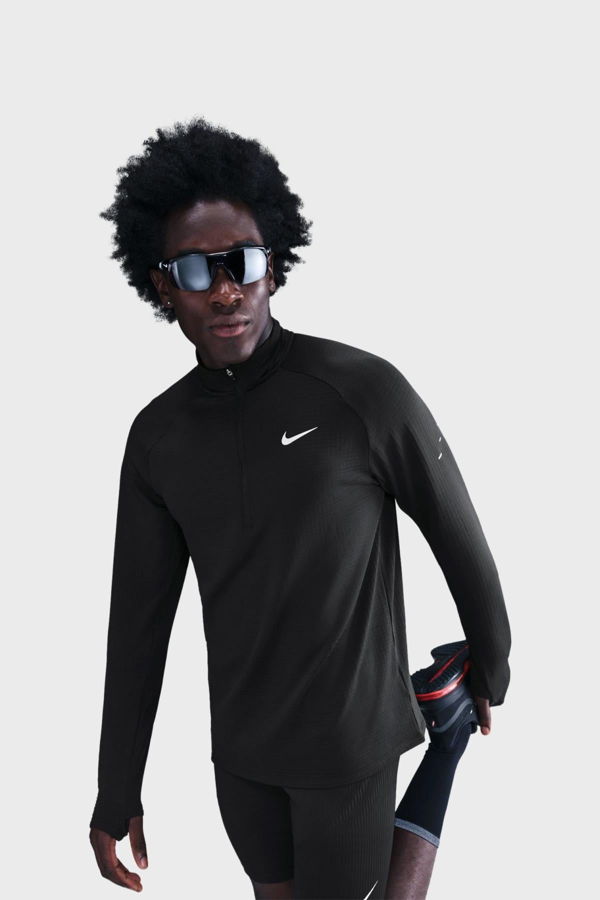 Nike -  STRIDE Men's Therma-FIT Repel Half-Zip Winter Running Top